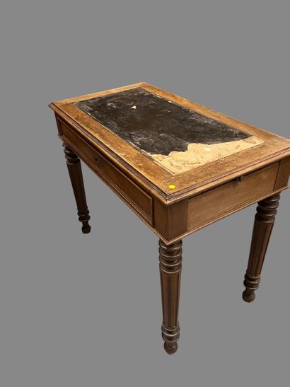 Octagonal pedestal table on canted shaft.
19th...