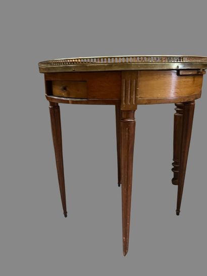 Octagonal pedestal table on canted shaft.
19th...