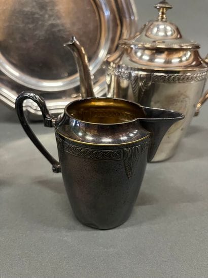 Silver-plated teapot and milk jug decorated...