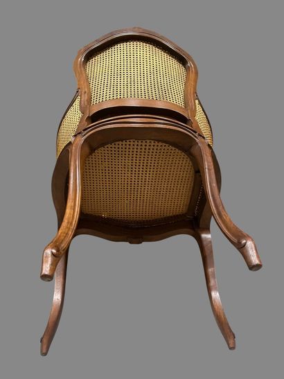 Natural wood molded caned child's bergère,...