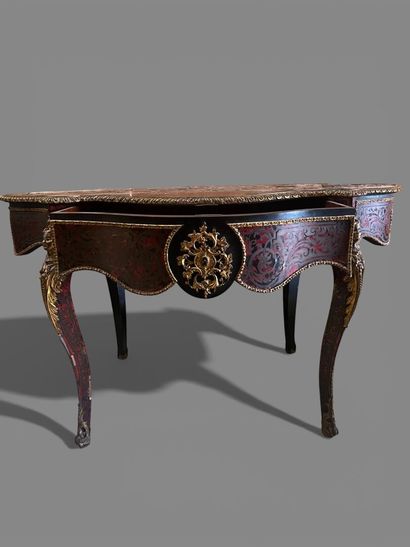 A Boulle-style red tortoiseshell veneered...