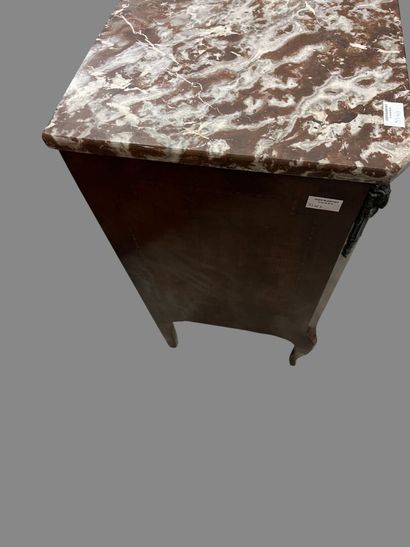 Veneered chest of drawers opening to three...