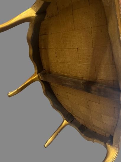 Gilded molded wood marquise carved with flowers,...