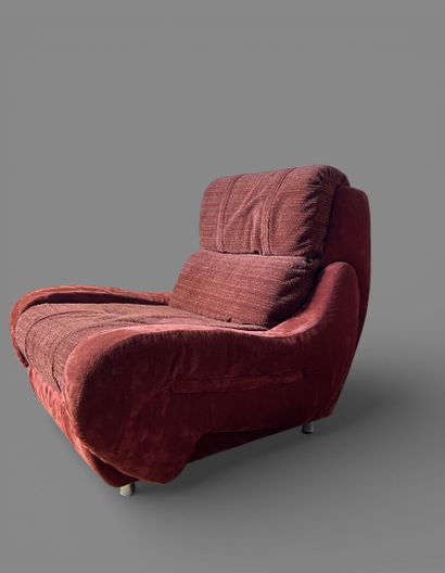 Comfortable armchair upholstered in orange...