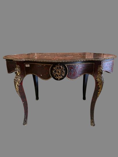 A Boulle-style red tortoiseshell veneered...