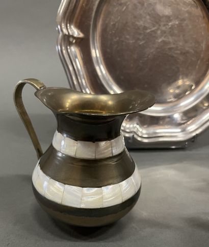 Silver-plated teapot and milk jug decorated...