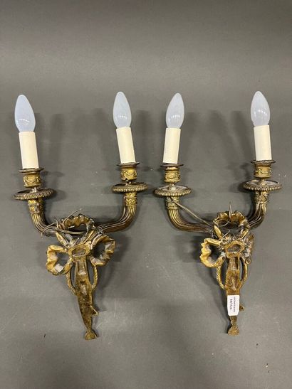 Pair of two-light ormolu sconces, the shafts...