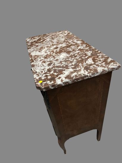 Veneered chest of drawers opening to three...