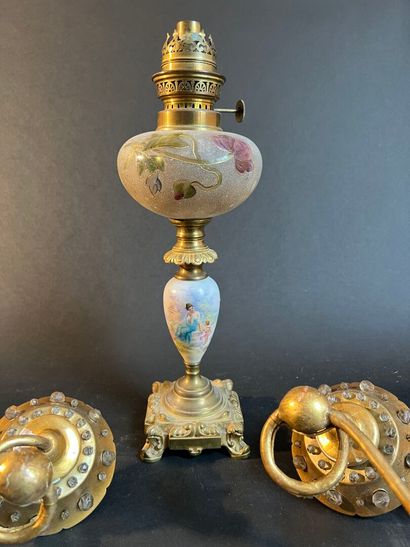 Gilt bronze oil lamp base, the porcelain...
