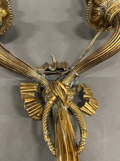 Pair of two-light ormolu sconces, the shafts...
