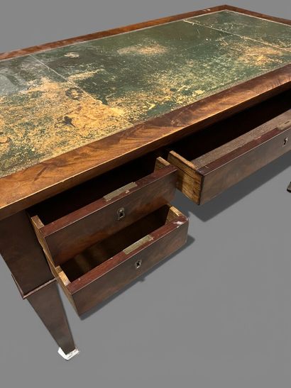 Mahogany veneered flat desk, with four drawers...