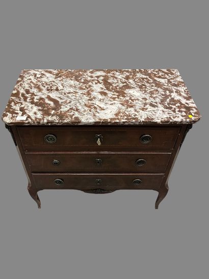 Veneered chest of drawers opening to three...