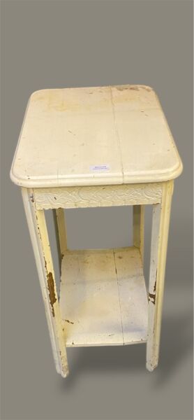 White stained wood tea table with one shelf.
Damage...