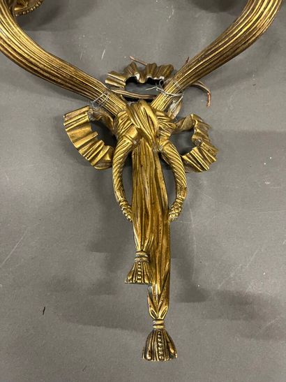 Pair of two-light ormolu sconces, the shafts...