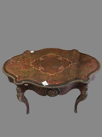 A Boulle-style red tortoiseshell veneered...