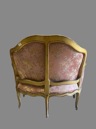 Gilded molded wood marquise carved with flowers,...