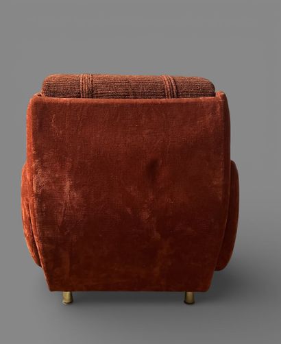 Comfortable armchair upholstered in orange...