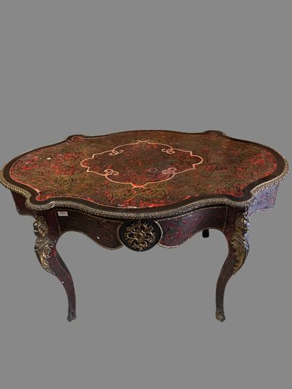 A Boulle-style red tortoiseshell veneered...