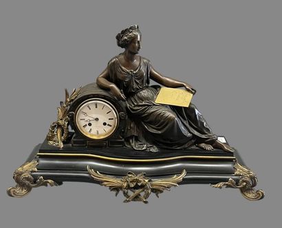 Bronze mantel clock with brown and gilded...