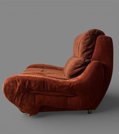 Comfortable armchair upholstered in orange...