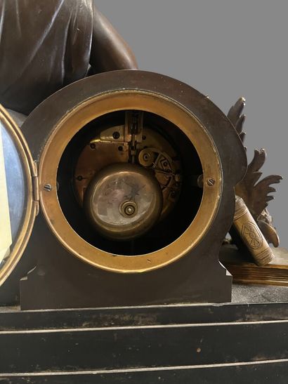 Bronze mantel clock with brown and gilded...