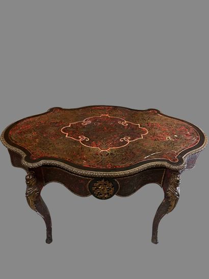 A Boulle-style red tortoiseshell veneered...