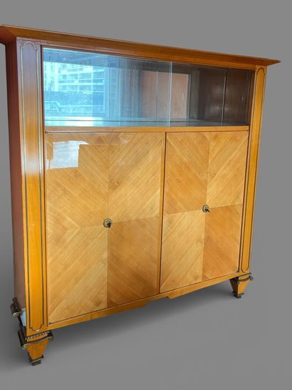 Light wood veneered silver cabinet opening...
