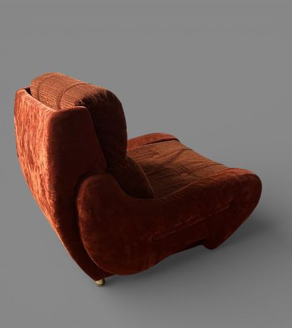 Comfortable armchair upholstered in orange...