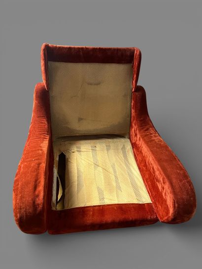 Comfortable armchair upholstered in orange...
