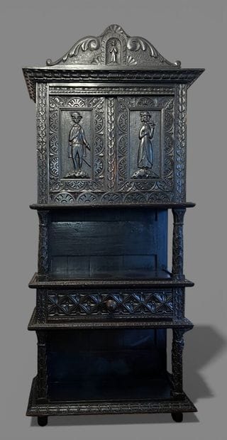 Dark patina wood cabinet with leafy moldings,...