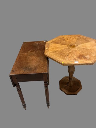 Octagonal pedestal table on canted shaft.
19th...
