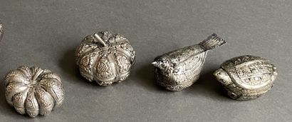 Two metal pill boxes in the shape of gourds
and...