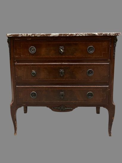 Veneered chest of drawers opening to three...