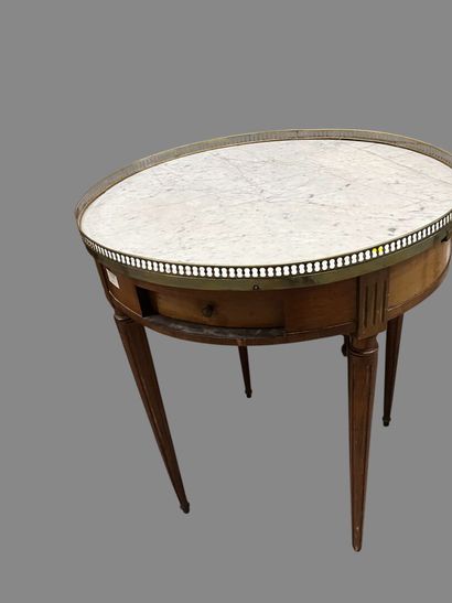 Octagonal pedestal table on canted shaft.
19th...
