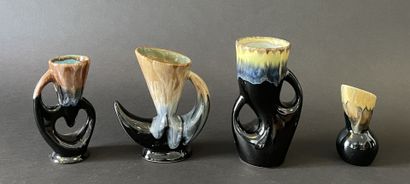 Suite de quatre vases de formes libres en...