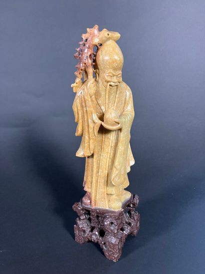 Chine, XXe siècle
Groupe en stéatite, représentant...