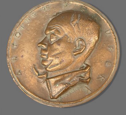 Lot de médailles en bronze dont :
-Thème...