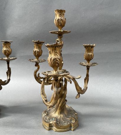 Paire de candélabres en bronze doré à quatre...