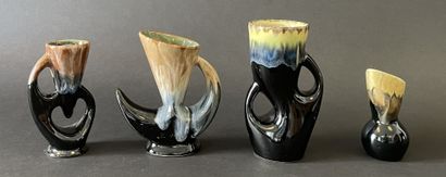 Suite de quatre vases de formes libres en...