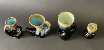 Suite de quatre vases de formes libres en...