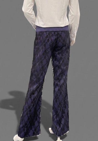 MELO E GRANO 
Burgundy pants accented with...