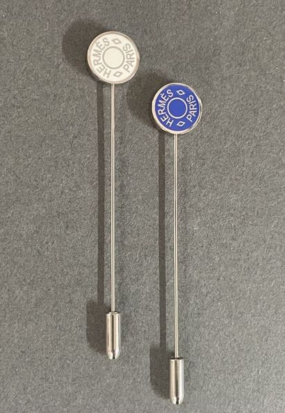 HERMÈS Paris 
Set of two lapel pins, each...