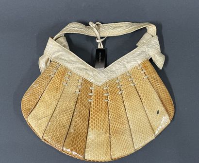 Stéphane KELIAN 
Patent python bag, handle,...