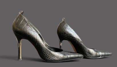 VERSACE 
Pair of black leather pumps with...