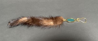 ANONYMOUS
Charm adorned with a mink tail...