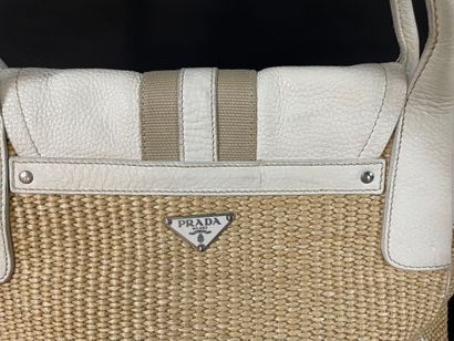 PRADA
40 cm tote bag in beige raffia, white...