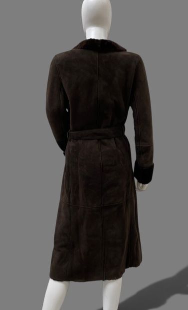 LOEWE
Brown shearling coat with a shawl collar...