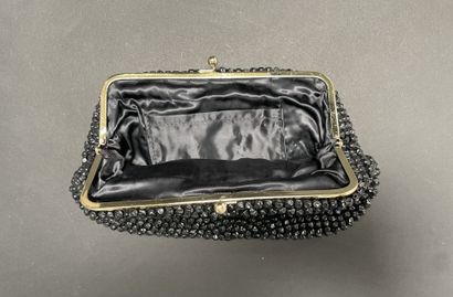 ANONYMOUS
Set of three beaded pouches, one...