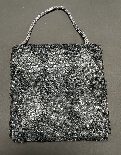 ANONYMOUS
Set of three beaded pouches, one...