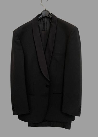TORRENTE
Black wool tuxedo jacket with a...